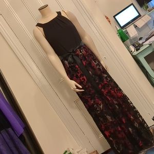 Elegant Black Dress with Red Floral Skirt detail